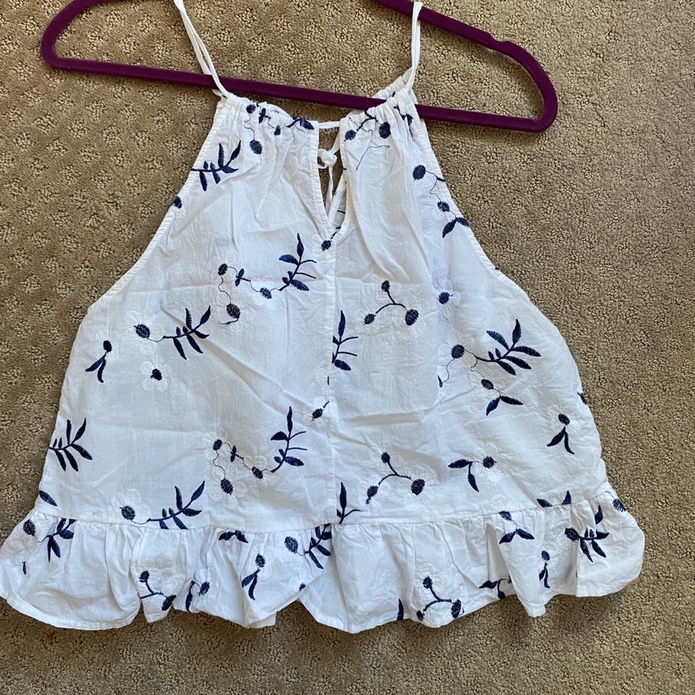 White blouse with blue flowers